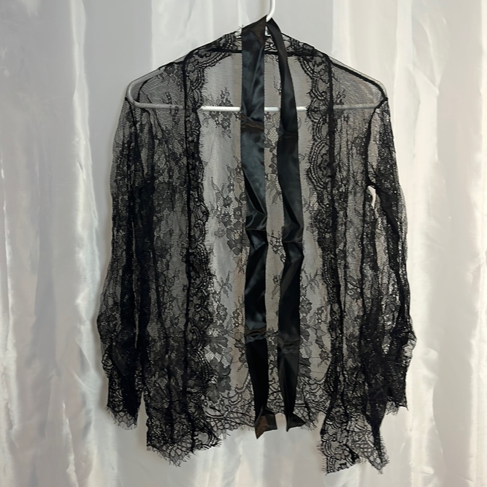 Women’s sexy sheer robe and g-string set. 2010